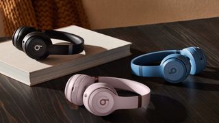 Beats Solo 4 headphones in black, pink and blue colors