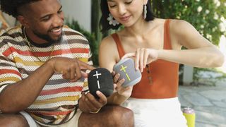 A pair of people comparing their Ultimate Ears Wonderboom 4 speakers