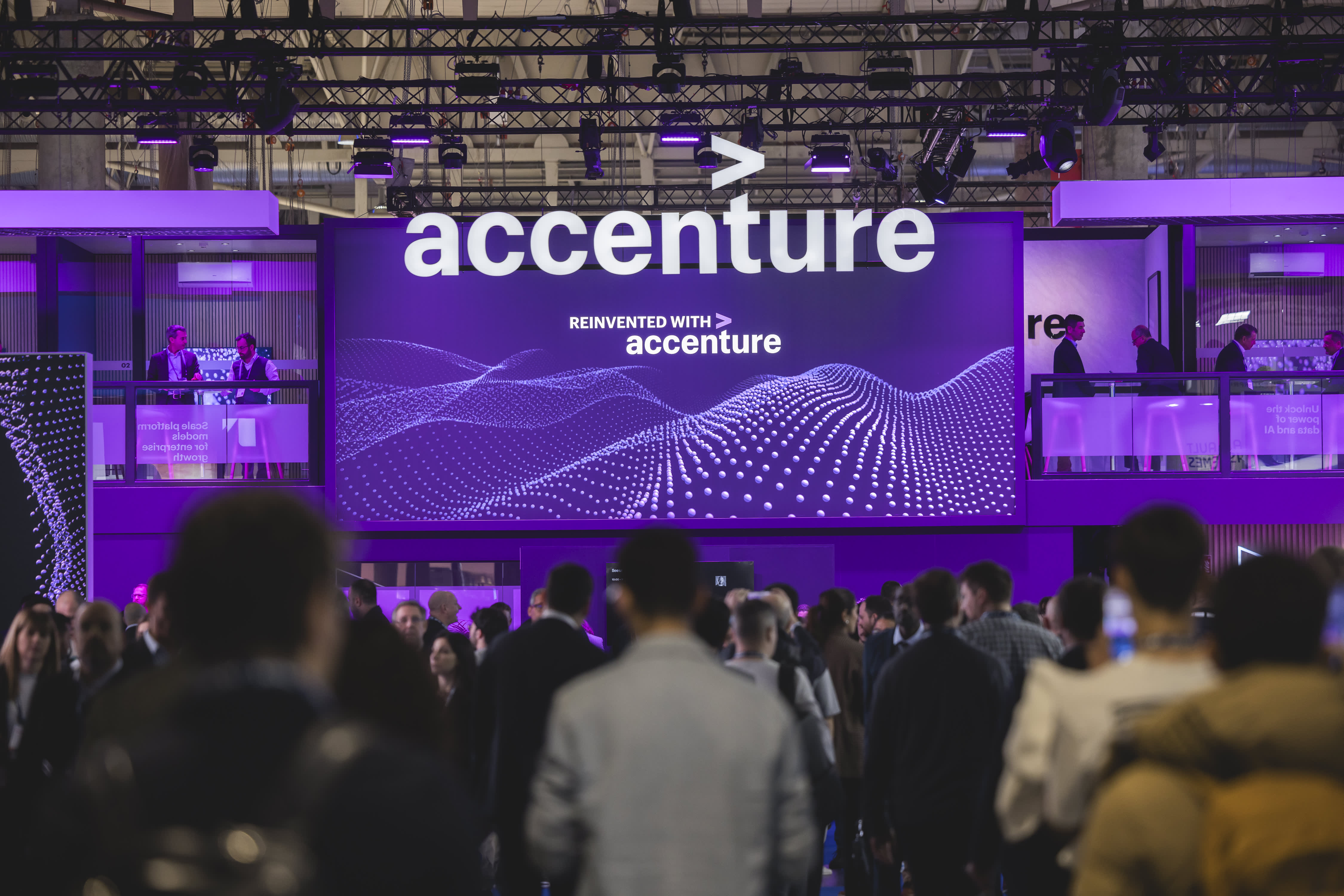 A logo sits illuminated at the Accenture booth in Mobile World Congress 2025 on March 03, 2025 in Barcelona, Spain.