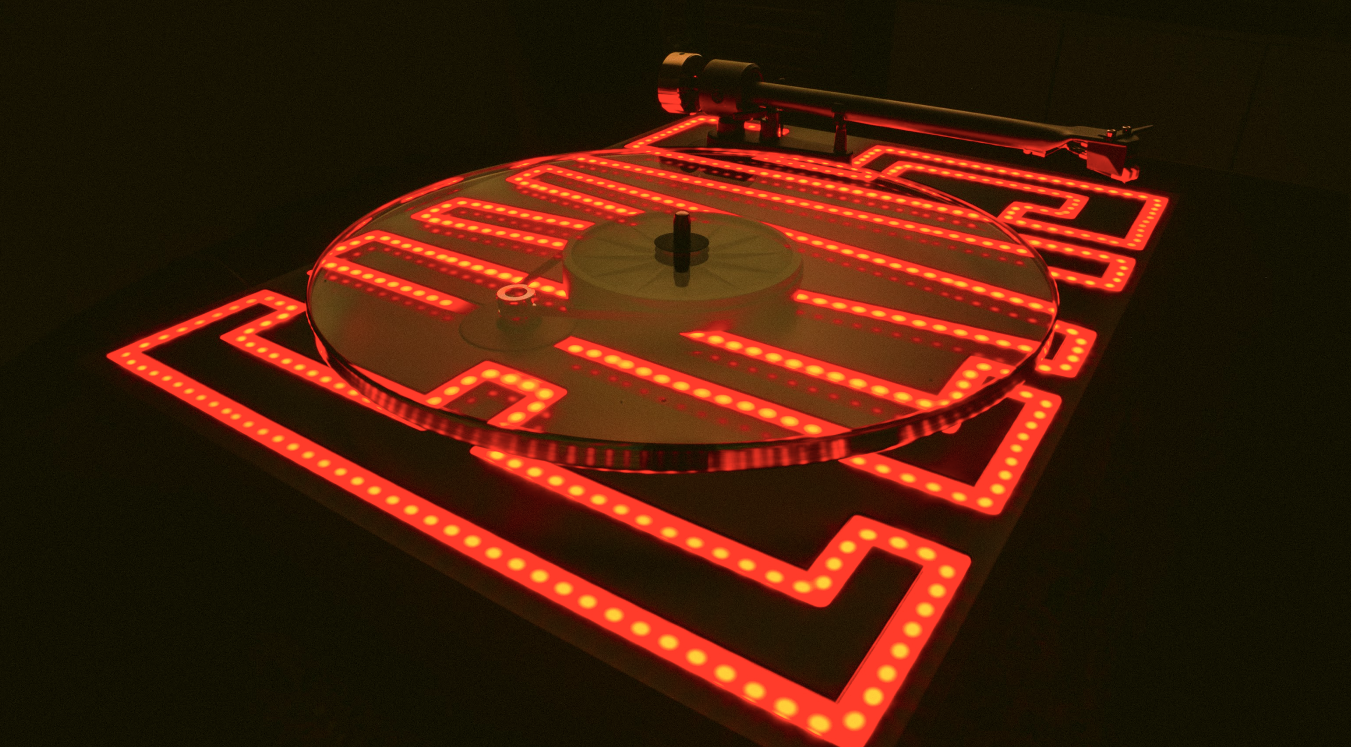 Pro-Ject's Elvis themed turntable on black background